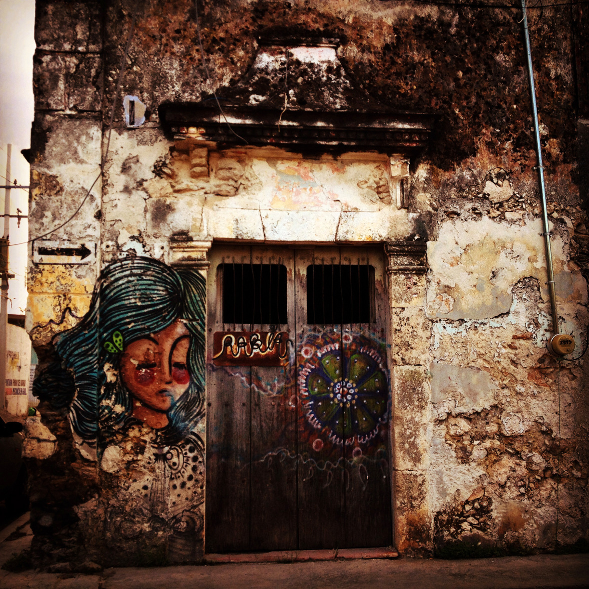 Old door and street art in Mexico Double-Barrelled Travel